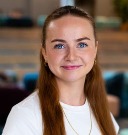 Smiling headshot of Annie Angus looking at the camera