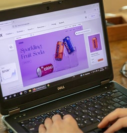 Person using laptop to use Wix's website editor